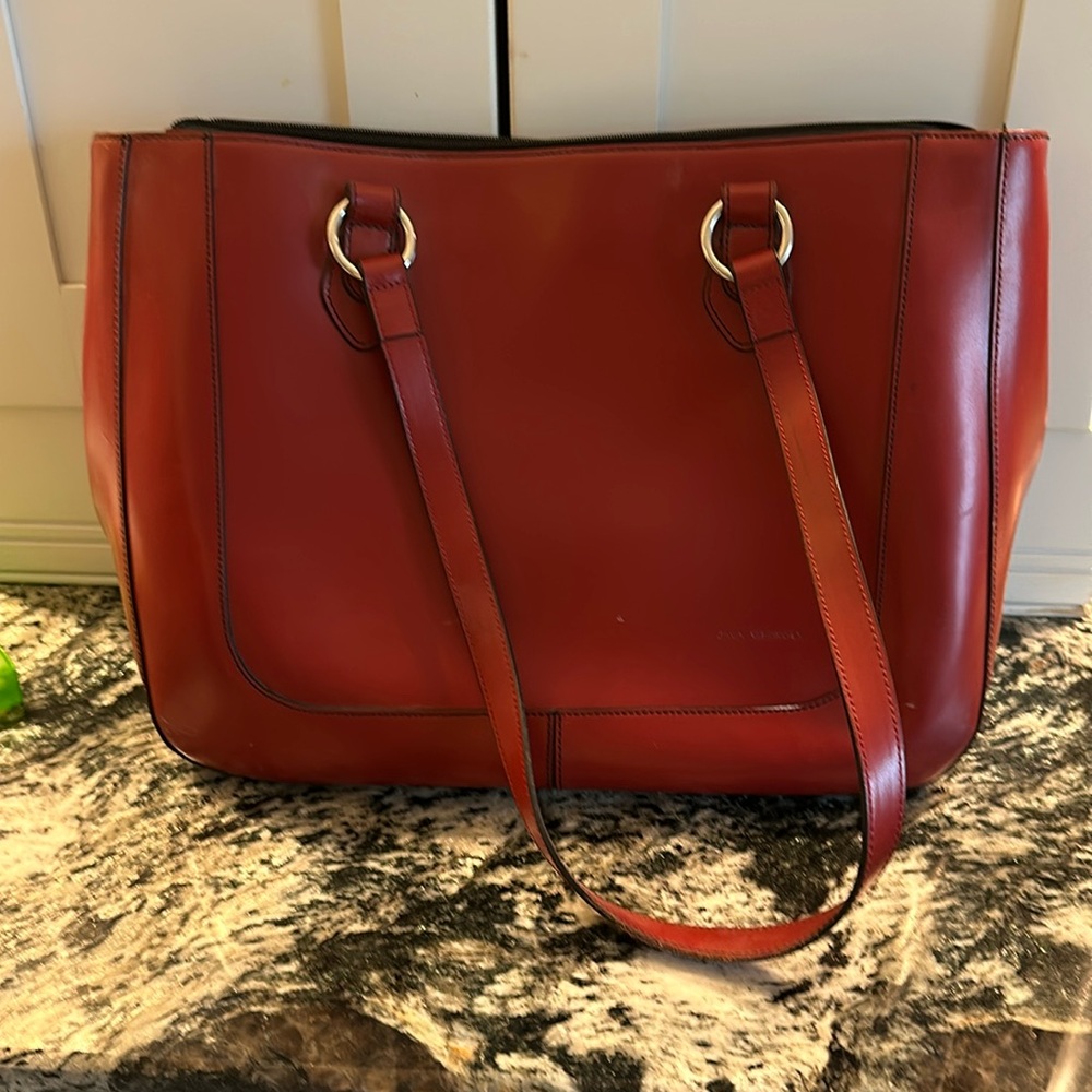 Jack Georges red leather computer tote.